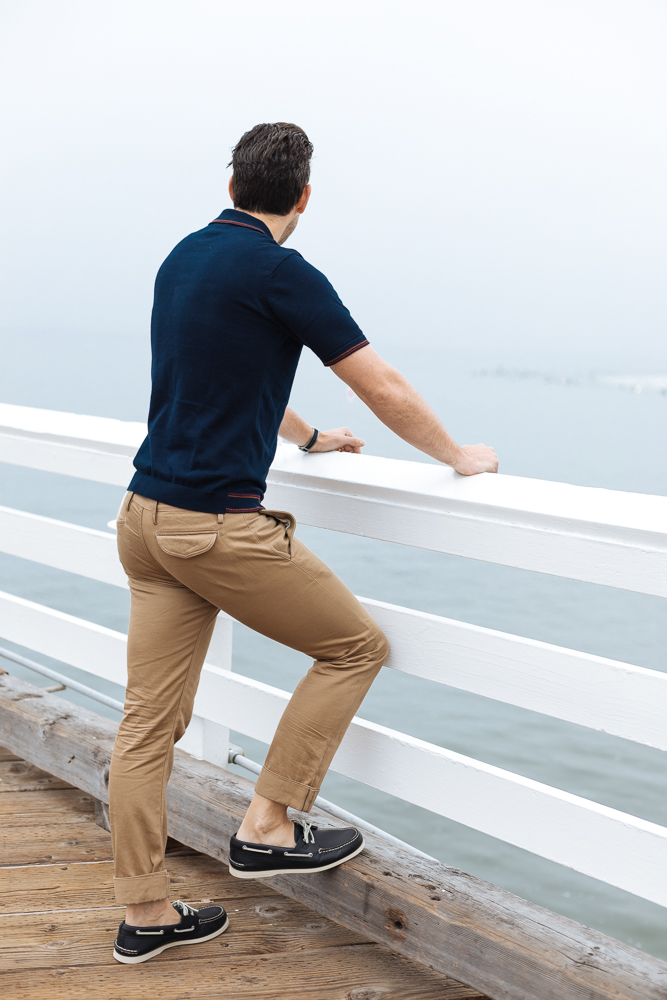 Lifestyle blogger Devin McGovern of Outlined Cloth takes a stroll in Malibu in original Sperry boat shoes