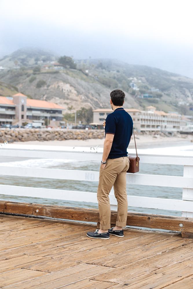 Lifestyle blogger Devin McGovern of Outlined Cloth takes a stroll in Malibu in original Sperry boat shoes