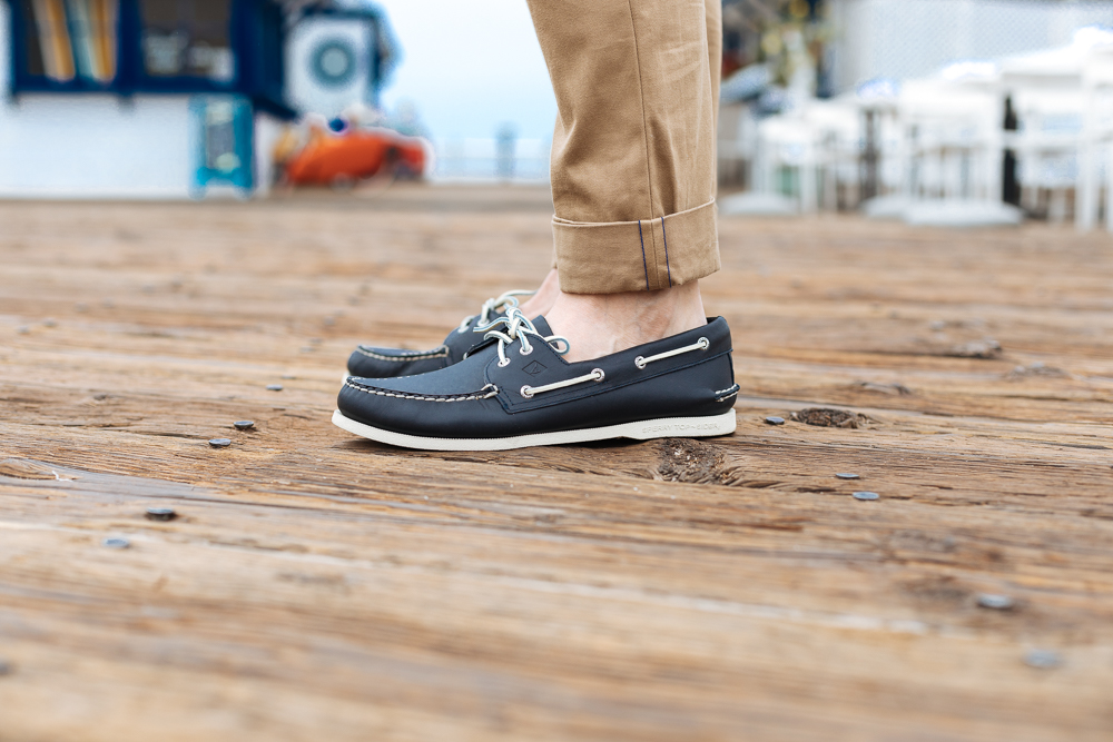 Lifestyle blogger Devin McGovern of Outlined Cloth takes a stroll in Malibu in original Sperry boat shoes