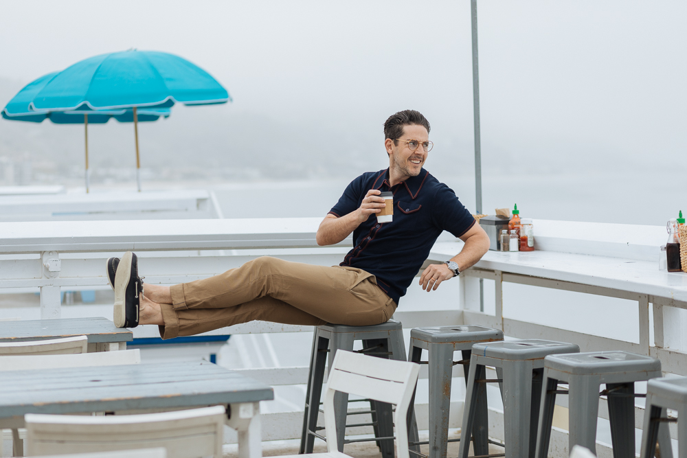 Lifestyle blogger Devin McGovern of Outlined Cloth takes a stroll in Malibu in original Sperry boat shoes