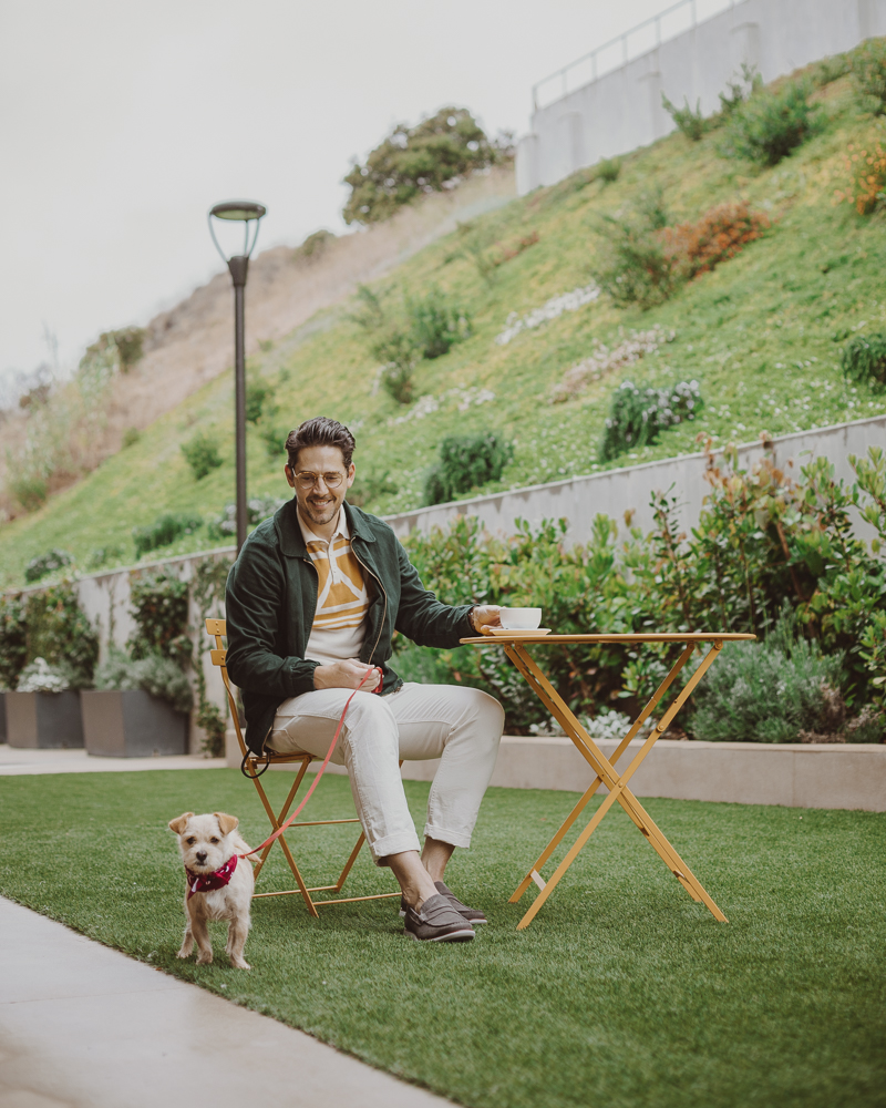 Lifestyle blogger Devin McGovern of Outlined Cloth takes a stroll in Malibu with a puppy and the Kennedy Loafers from Sperry