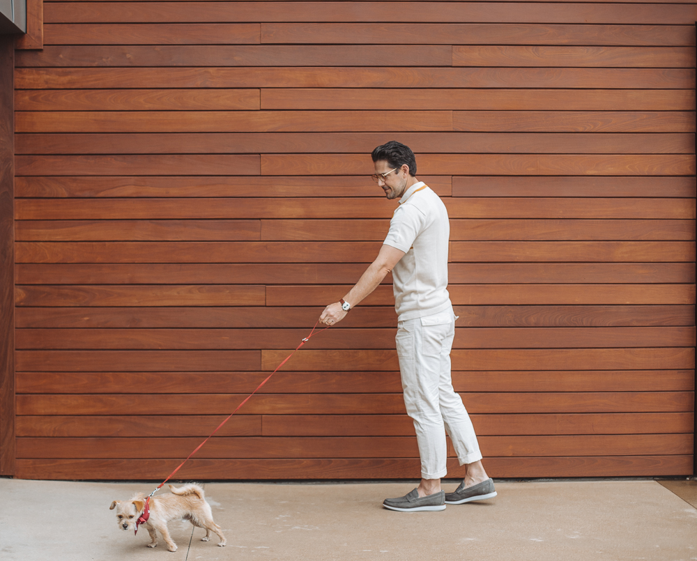 Lifestyle blogger Devin McGovern of Outlined Cloth takes a stroll in Malibu with a puppy and the Kennedy Loafers from Sperry