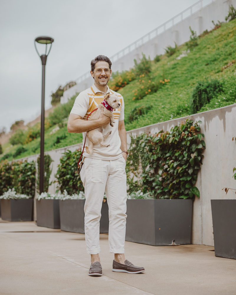 Lifestyle blogger Devin McGovern of Outlined Cloth takes a stroll in Malibu with a puppy and the Kennedy Loafers from Sperry