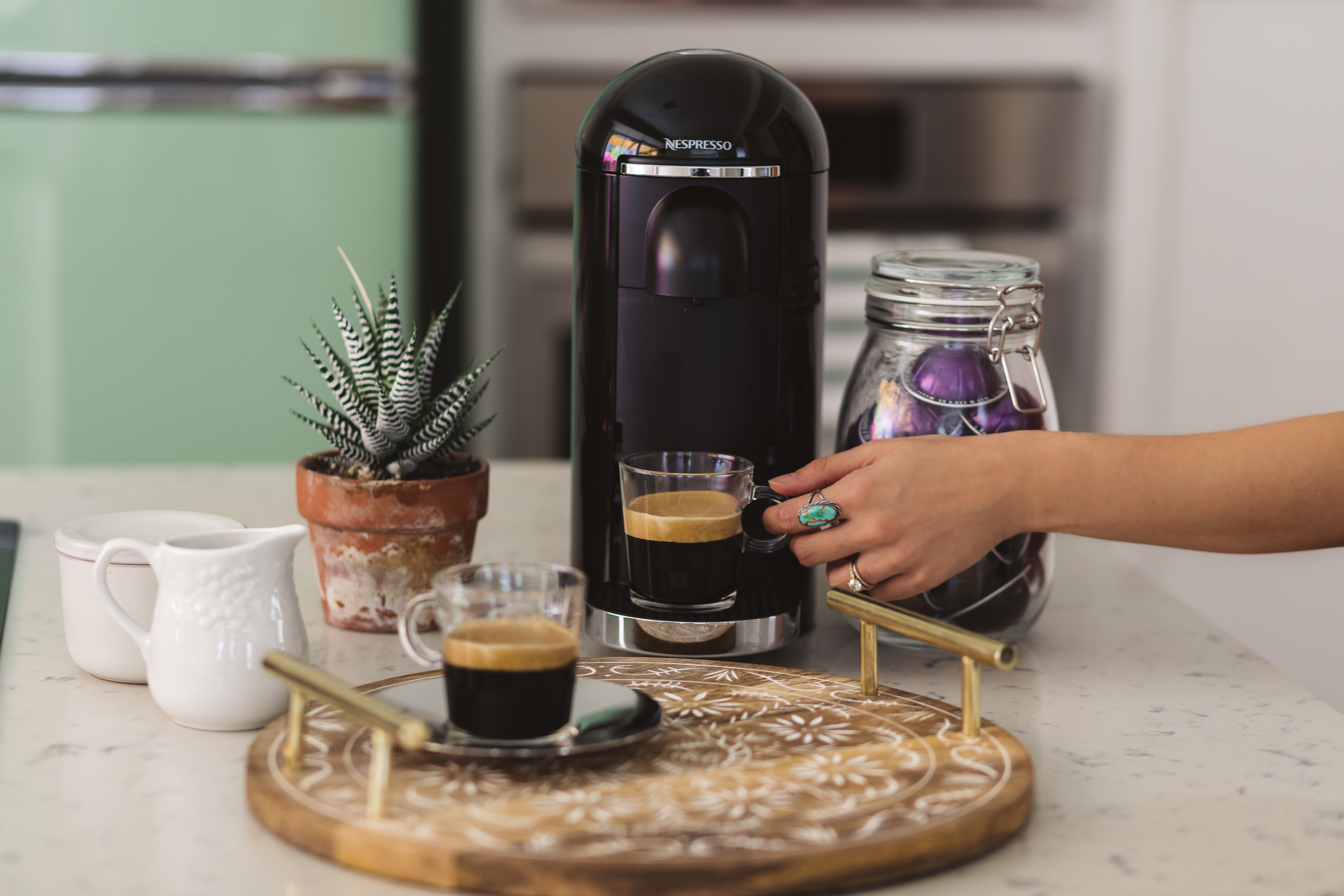 Lifestyle blogger Devin McGovern and wife Marlene Martinez morning coffee with Nespresso